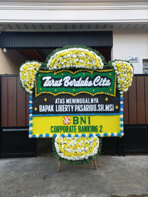 Papan Bunga Duka di Wakuwo