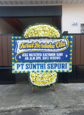 Papan Bunga Duka di Wakuwo