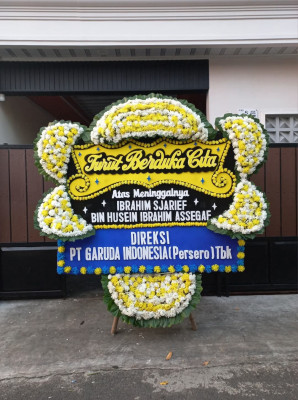 Papan Bunga Duka di Wakuwo